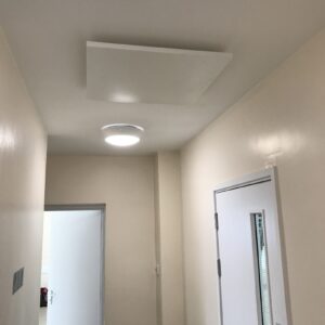 Village hall corridor heating with LAVA Basic DM infrared panels 