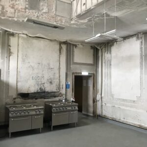 White SOLAMAGIC S2 in the kitchen suspended from a tension wire